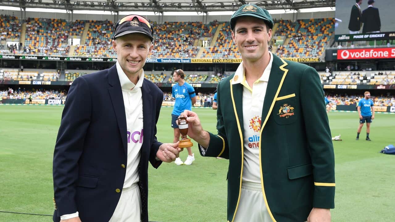 England captain Joe Root and Australian captain Pat Cummins pose for a photograph on day one of the First Test Match in the Ashes series