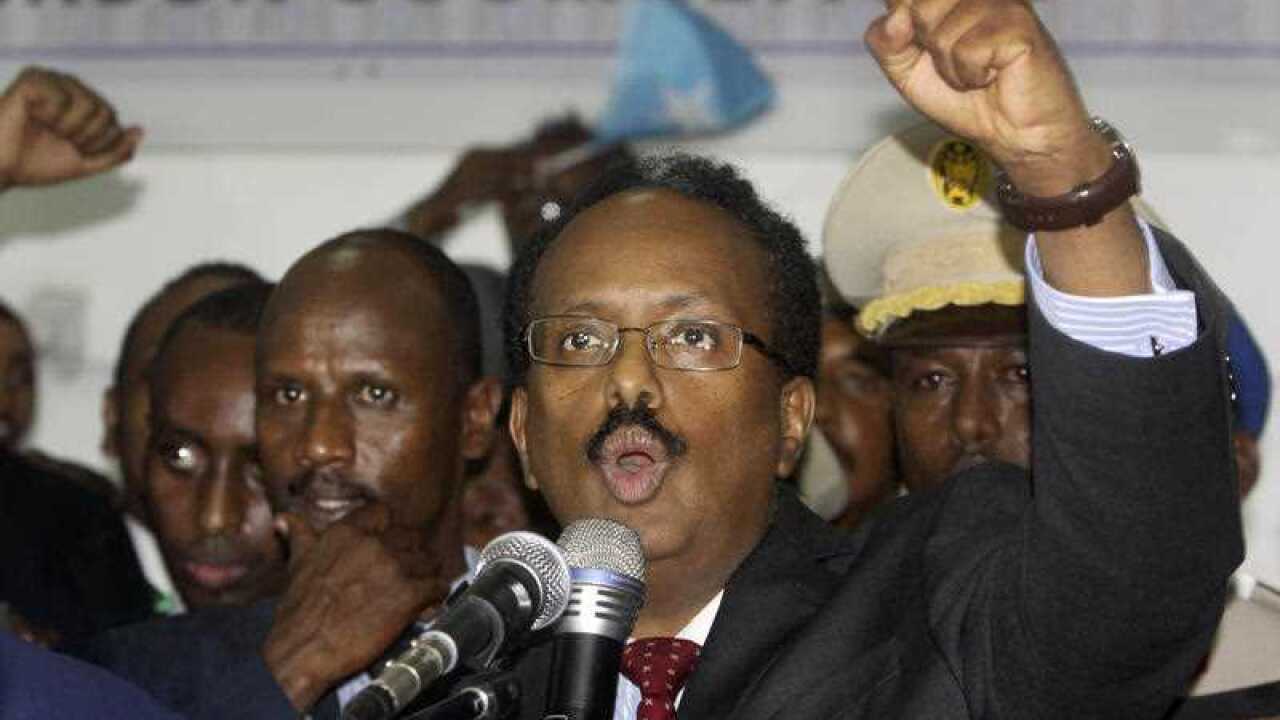 New Somali President Mohamed Abdullahi Farmajo celebrates winning the election and taking office in Mogadishu, Somalia Wednesday, Feb. 8, 2017.