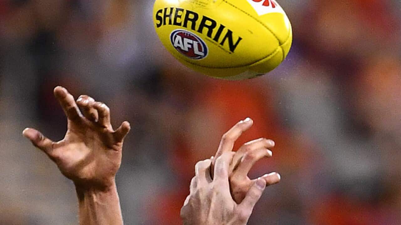 Generic picture of hands competing for the ball