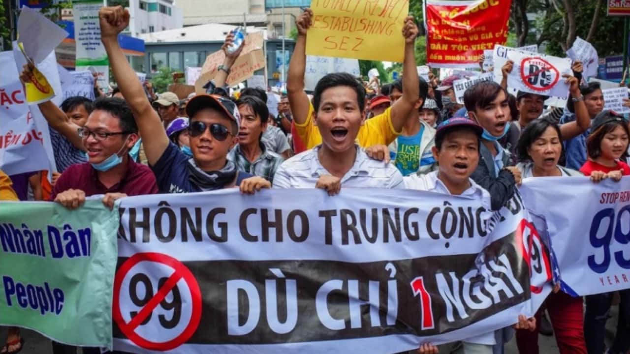 Vietnamese protest in Ho Chi Minh City on Sunday over a proposal to grant companies 99-year land leases in special economic zones.