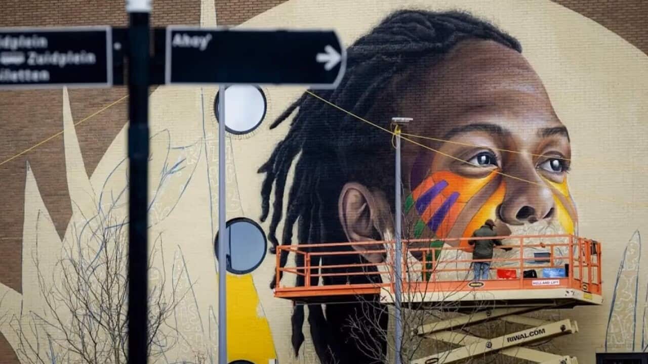 Tegenover Ahoy is een muurschildering gemaakt van Jeangu Macrooy