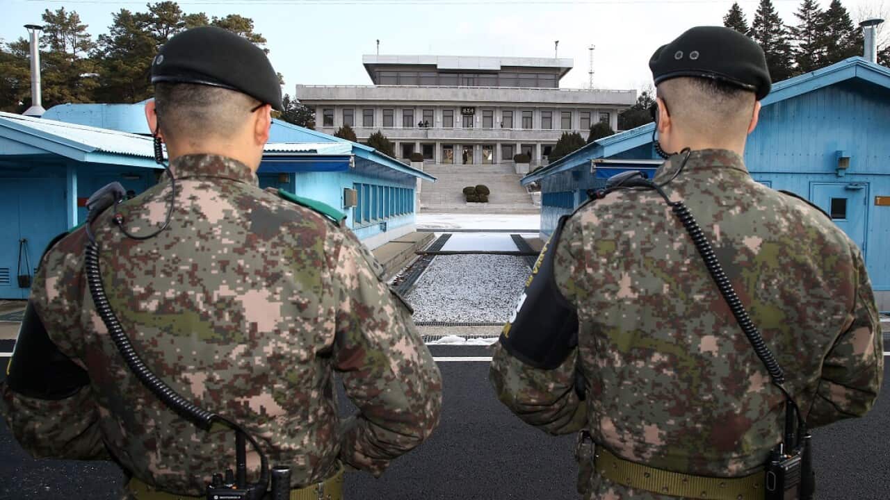 South Korean soldiers stand guard at the border village of Panmunjom.