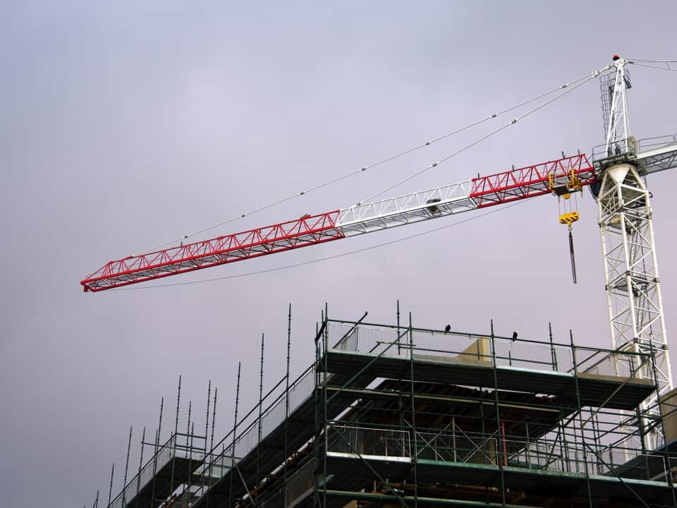 Crane on the construction site of new apartments
