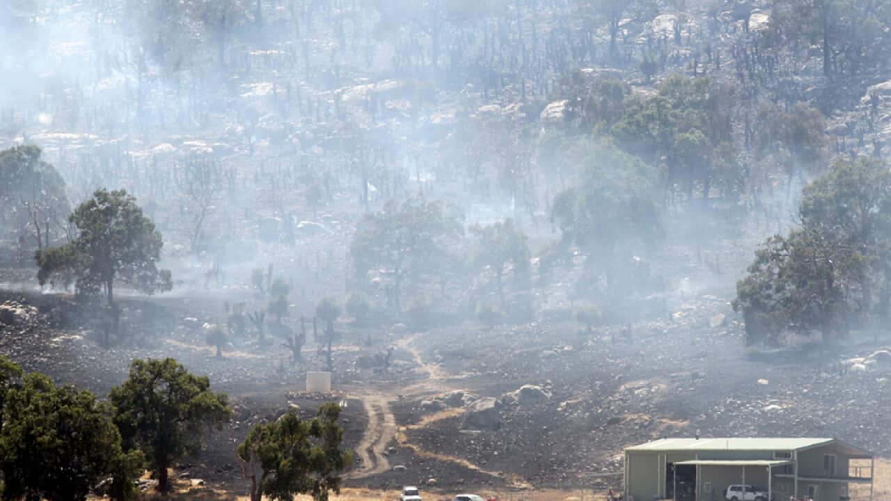 Bushfire hot spots continue to burn