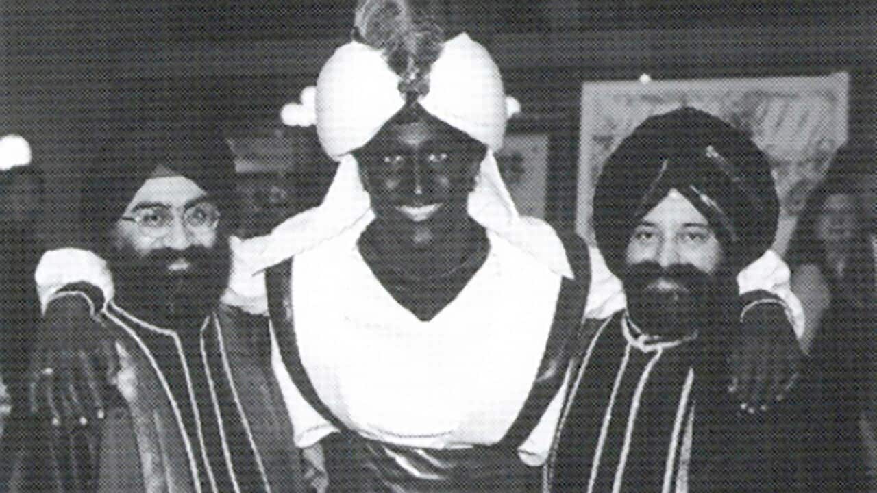 A photo shows a costumed Prime Minister Justin Trudeau, his face and hands darkened by makeup, attending a "Arabian Nights" gala