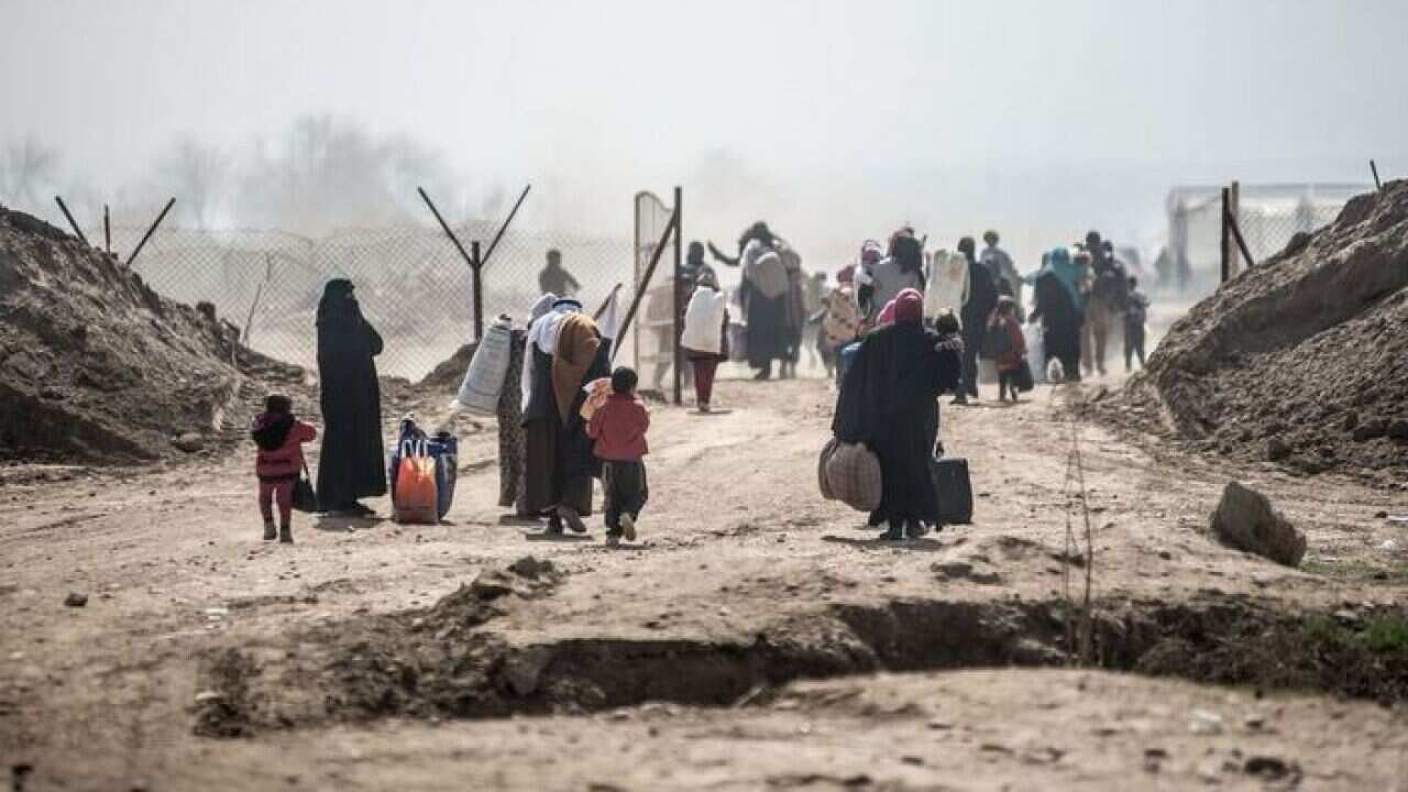Residents fleeing a national disaster