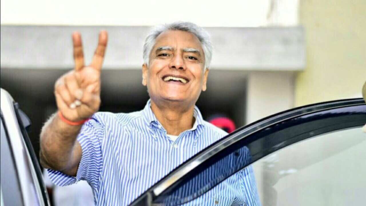 Sunil Jakhar makes a victory sign after a landslide win in Gurdaspur by elections