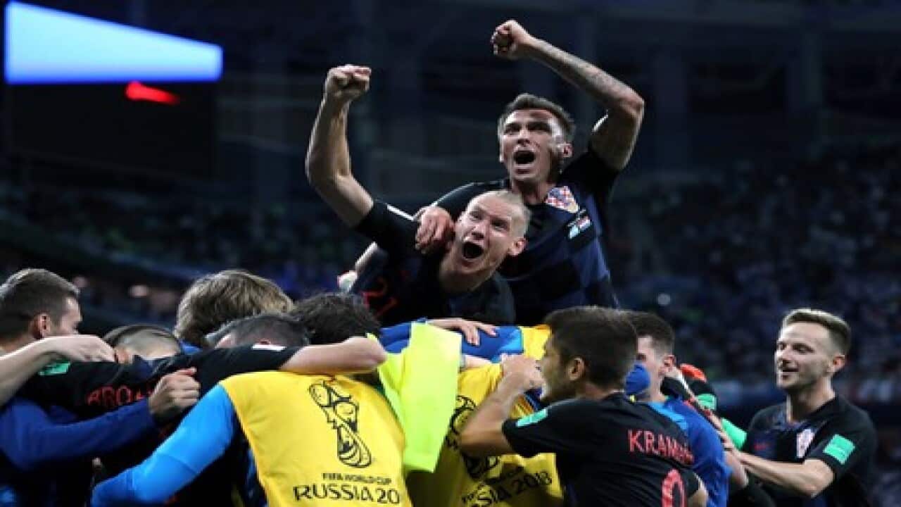 Classy Croatia rout Argentina to reach second round