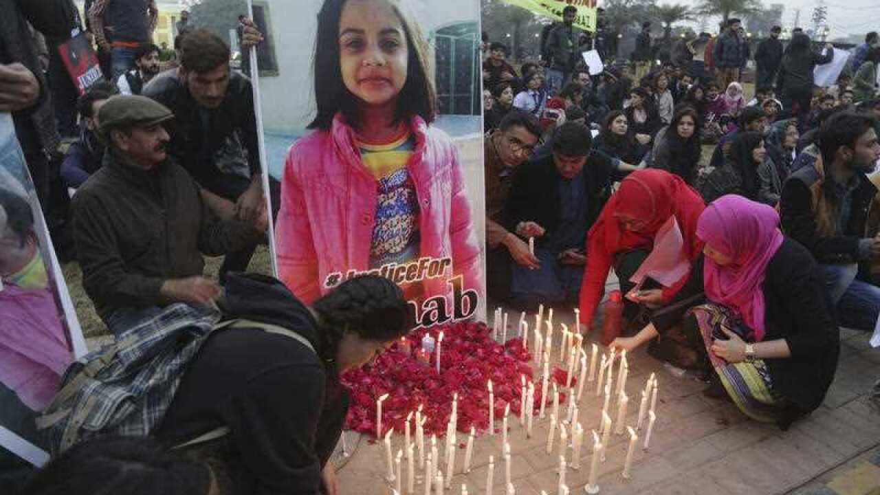 Pakistani students light candles during a protest rally to condemn the rape and killing of Zainab Ansari, an 8-year-old girl, last week in Kasur, Thursday, January 11, 2018, in Lahore, Pakistan.