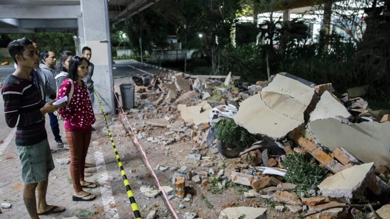 Parts of a mall building collapsed after an earthquake in Lombok.