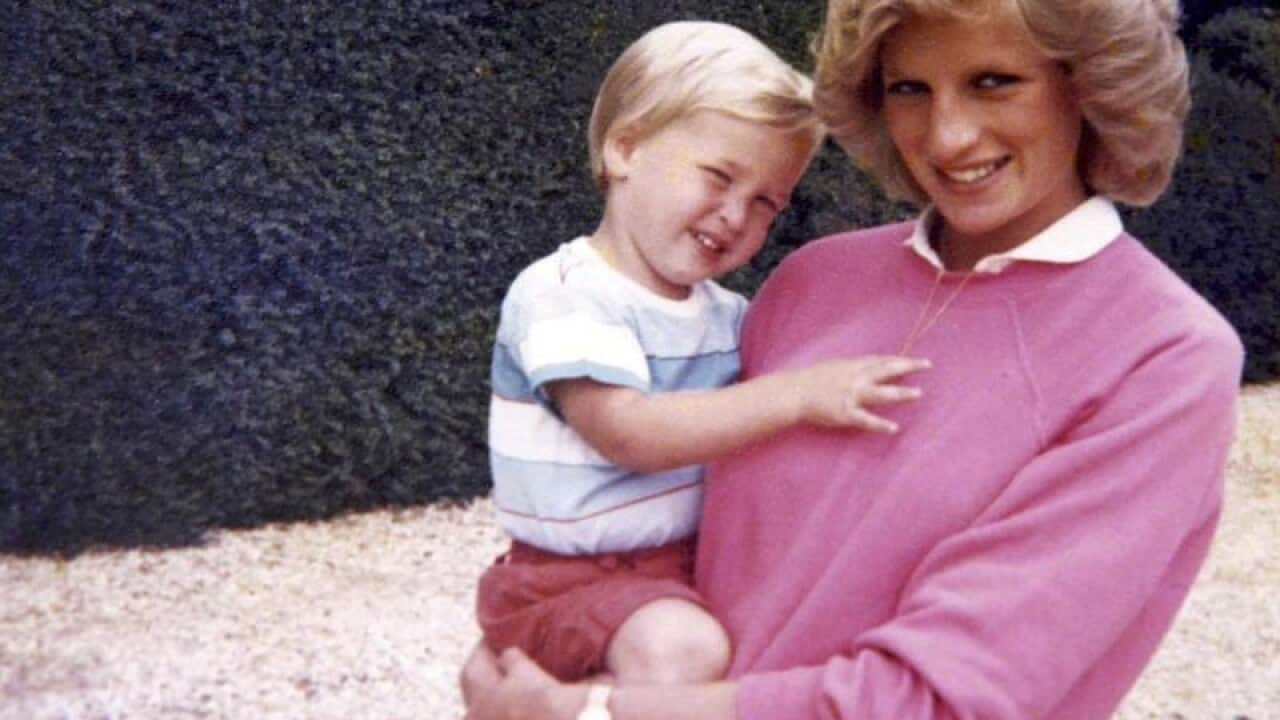 The late Diana, Princess of Wales, holding Prince William.