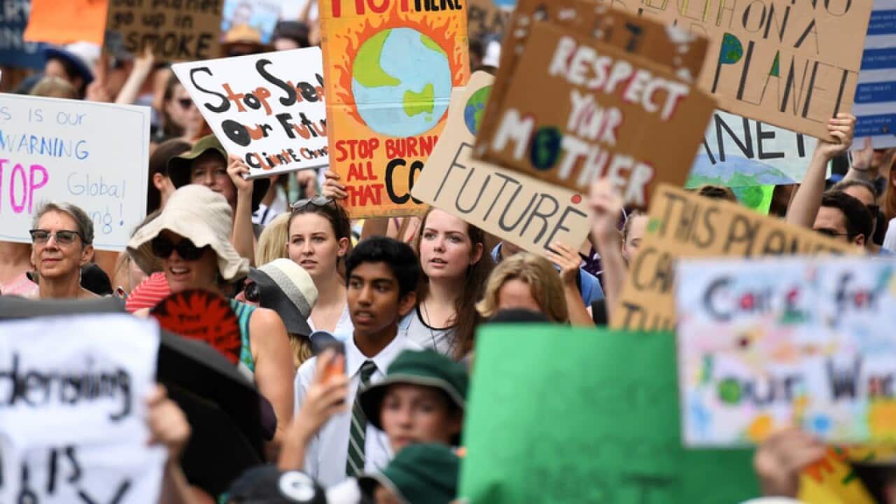 School students take part in a climate change strike in Brisbane