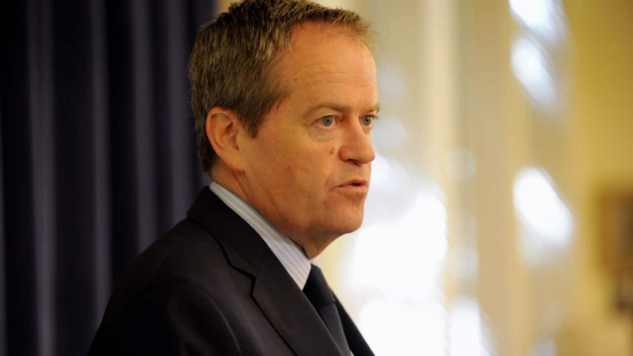 Opposition leader Bill Shorten addresses the ALP caucus at Parliament House in Canberra, Tuesday, Dec. 2, 2014. (AAP Image/Alan Porritt) NO ARCHIVING