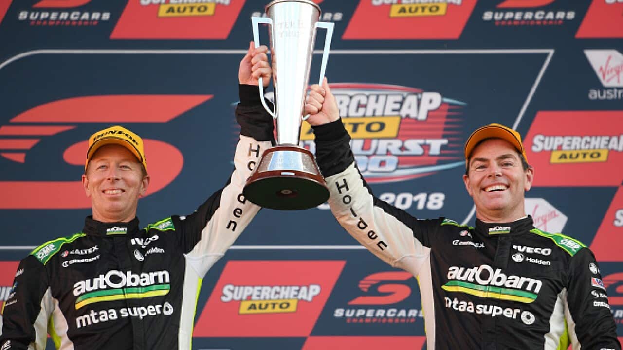 Steve Richards (L) and Craig Lowndes celebrate after winning the Bathurst 1000