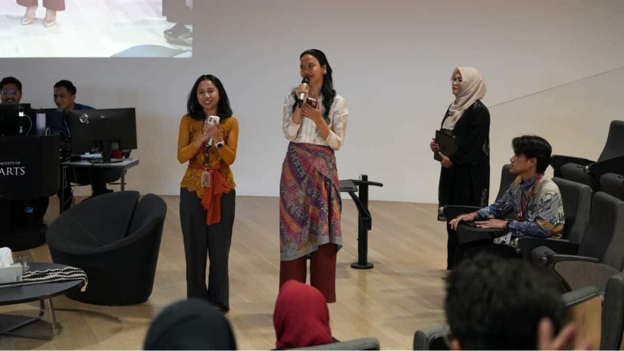 Garuda Contribution Fest 2026 co-chairs Puspita Seruni (L) and Valerie Krasnadewi (R) speaking at the event held at Arts West Building, The University of Melbourne.