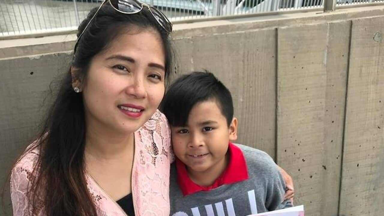 Bernadette Romulo and her son Giro.