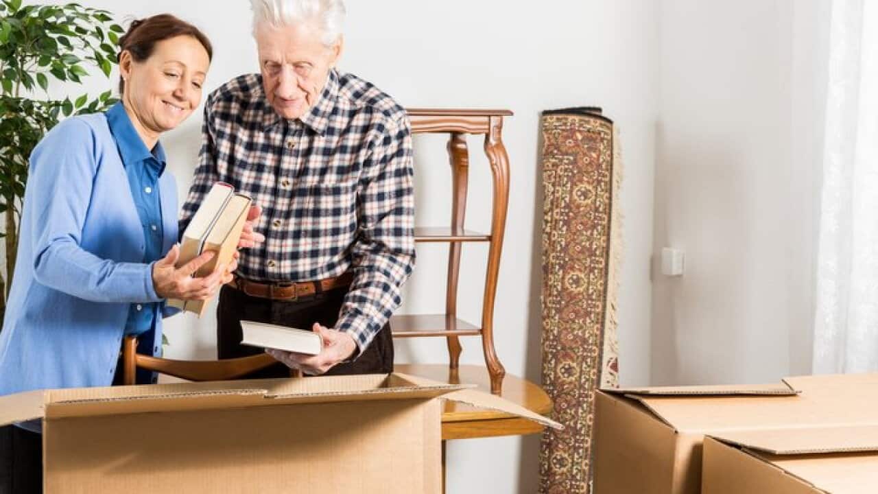 Senior adult moving house