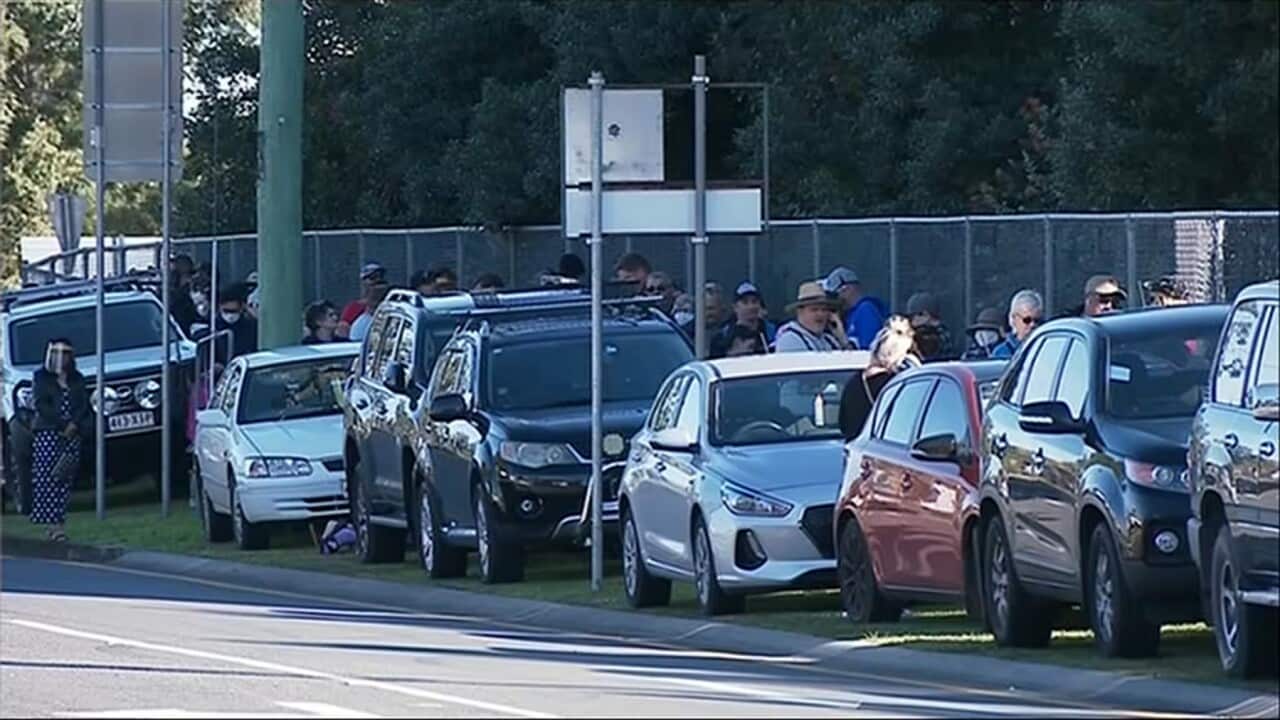 A queue waiting for testing at a Logan COVID-19 test centre