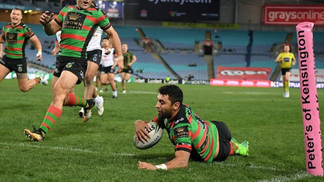 Alexander Johnston of the Rabbitohs scores a try