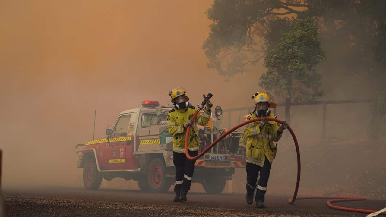 A supplied image of DFES fire fighters battling a blaze in Brigadoon, Perth, Tuesday, 2 February, 2021.