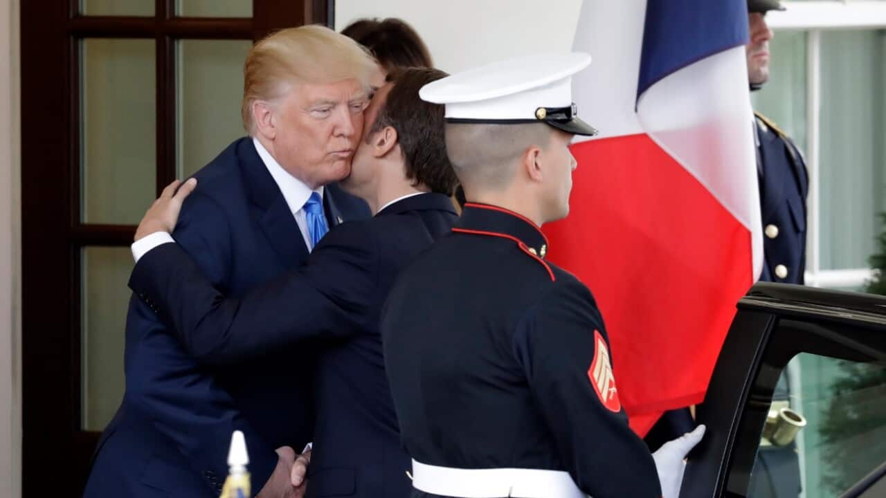 President Donald Trump and first lady Melania Trump greet French President Emmanuel Macron and his wife Brigitte Macron at the White House