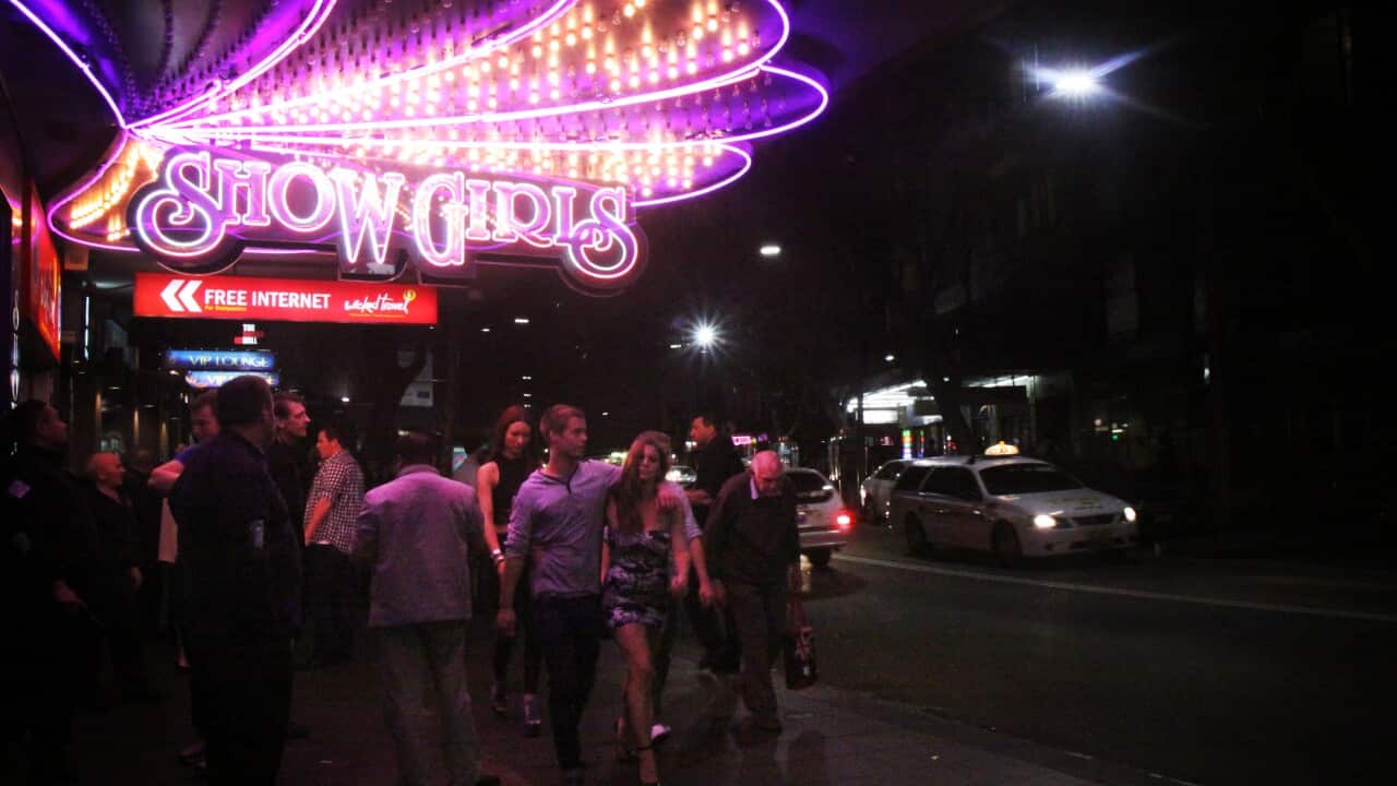 Visitors to Kings Cross red light district in Sydney on Friday, July 13, 2012. (AAP Image/April Fonti) NO ARCHIVING