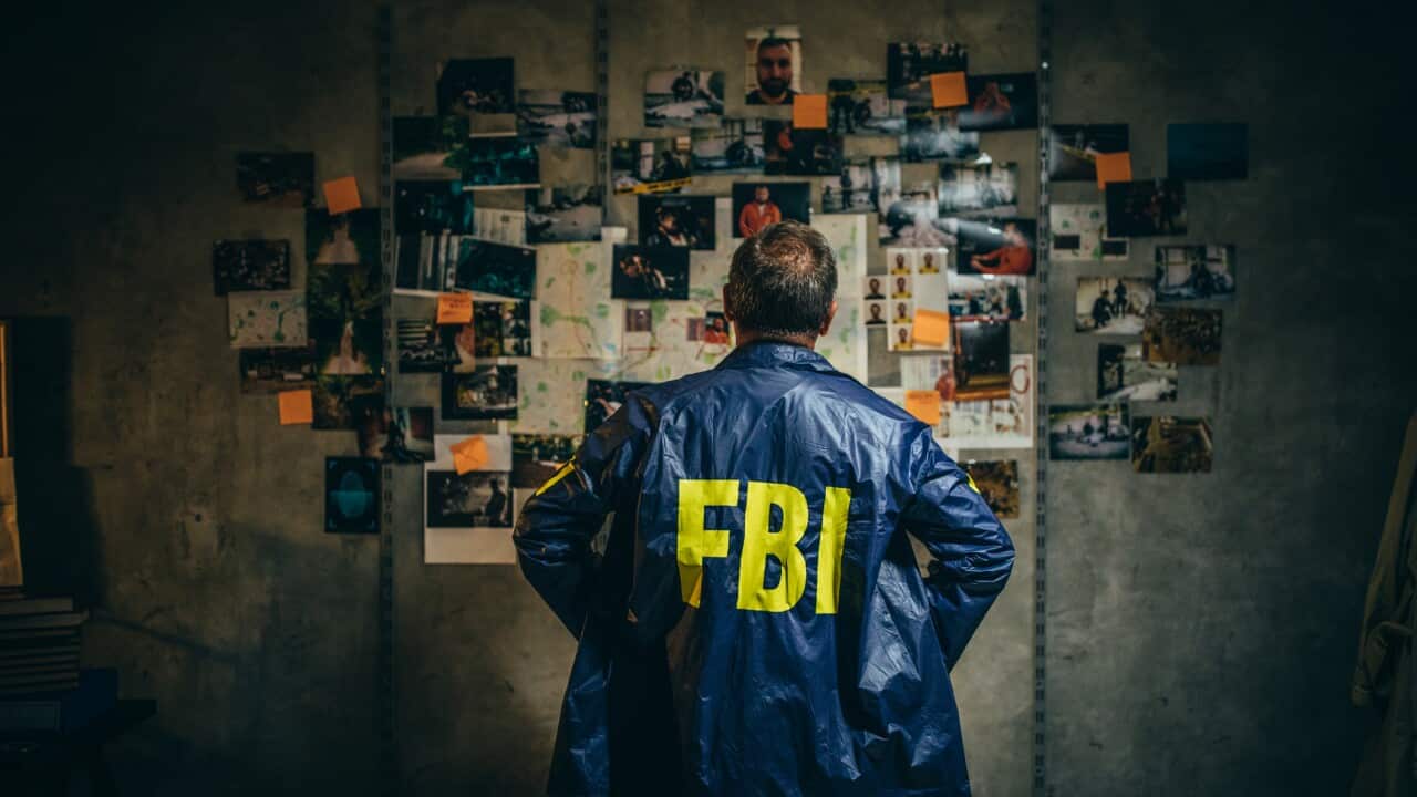 Mature FBI agent works on a case alone