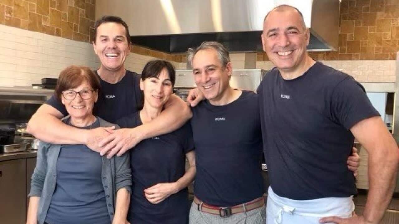 Saverio Russo with his family and chef Marco Bonanni