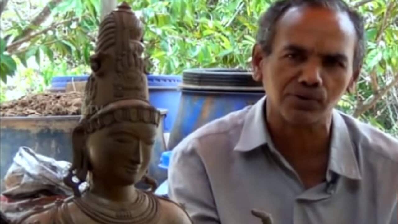 Sirpi Rajan with one of his statues