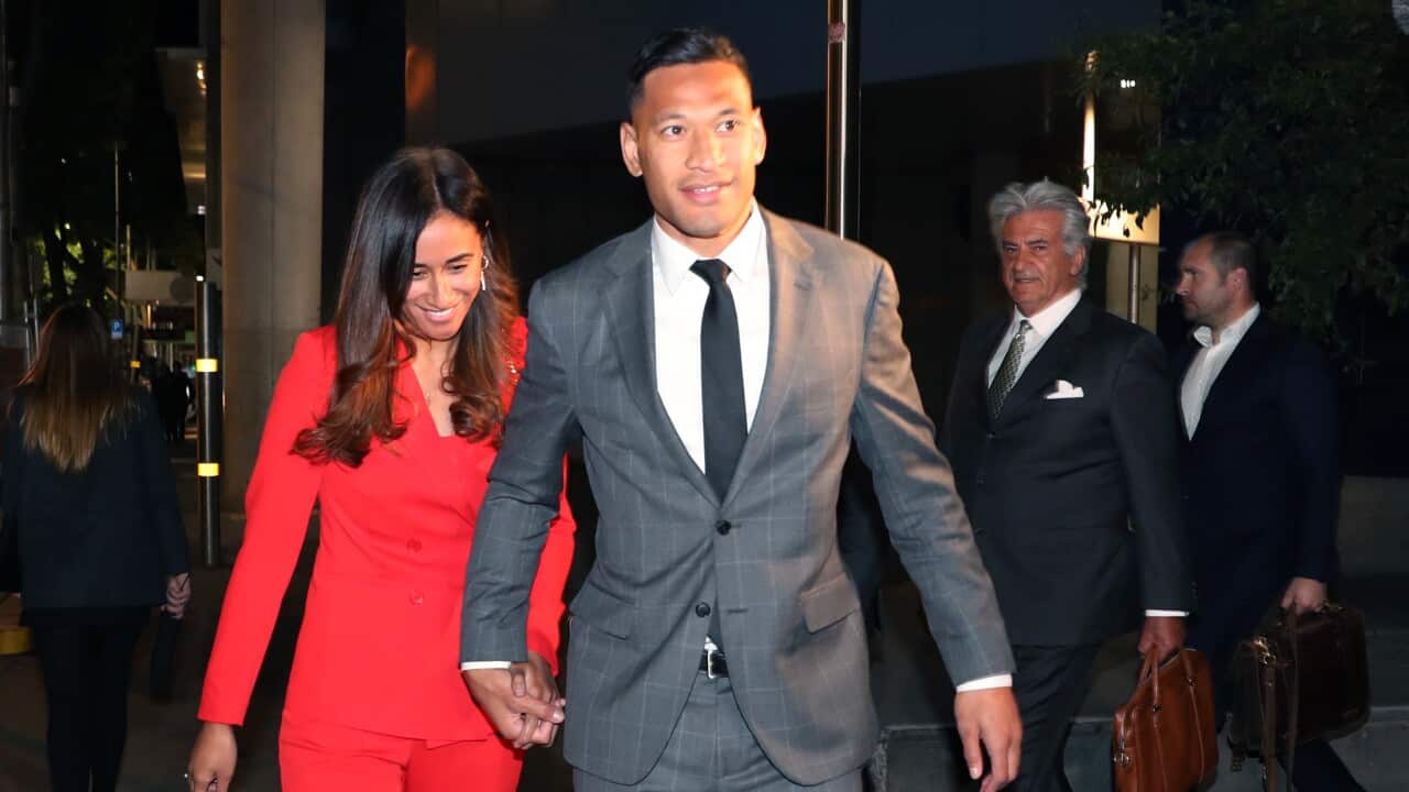 Israel Folau and his wife Maria leave the Federal Court in Melbourne after a long mediation with Rugby Australia.