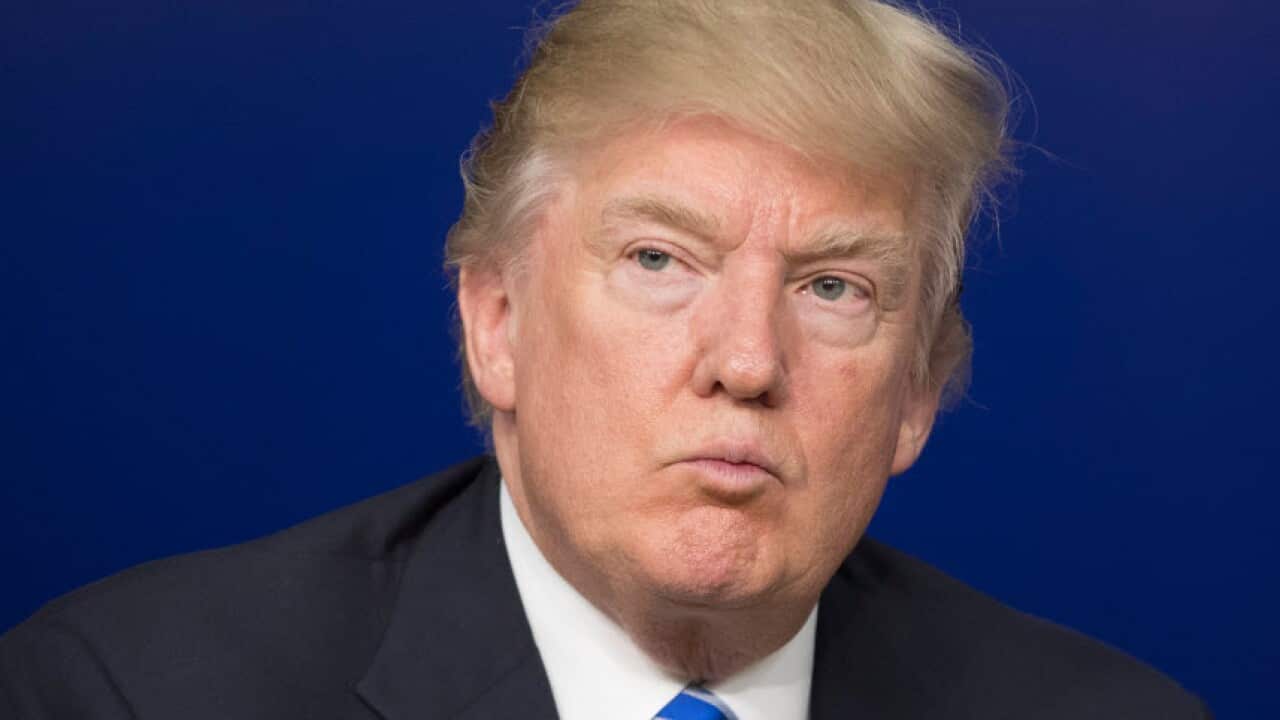 US President Donald J. Trump participates in a town hall meeting on the business climate in the United States.