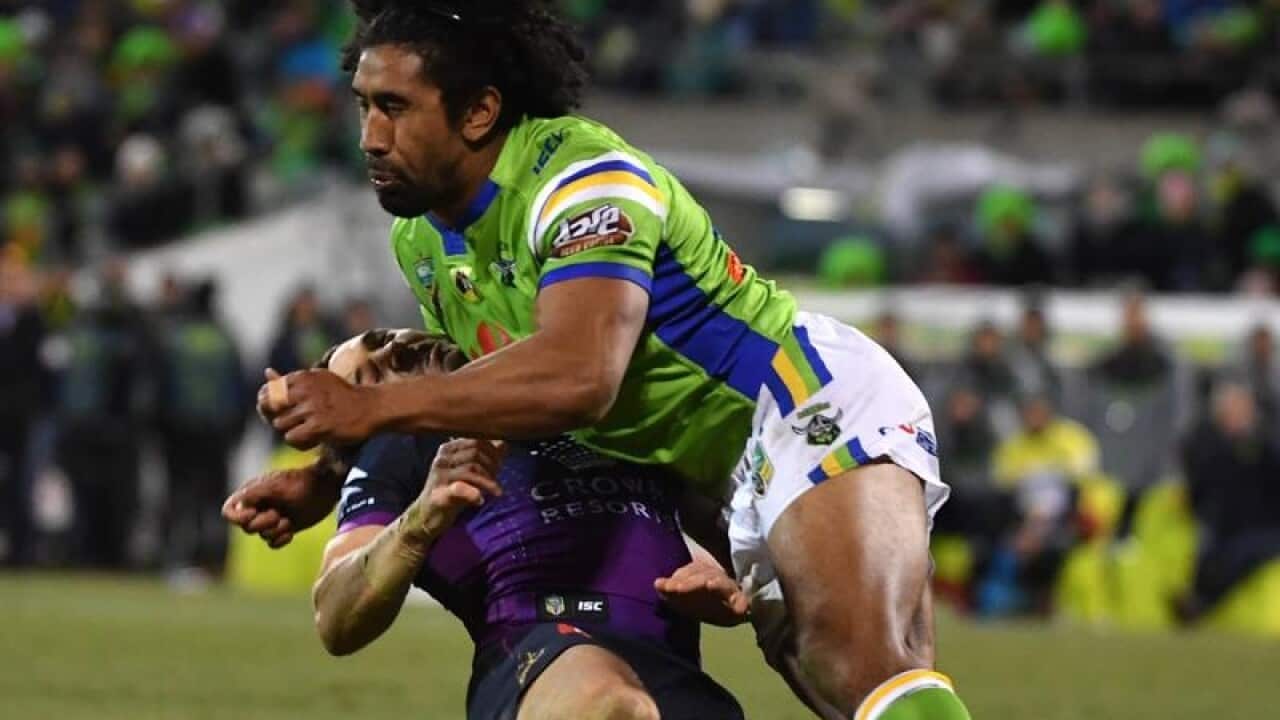 Billy Slater is knocked out by Iosia Soliola