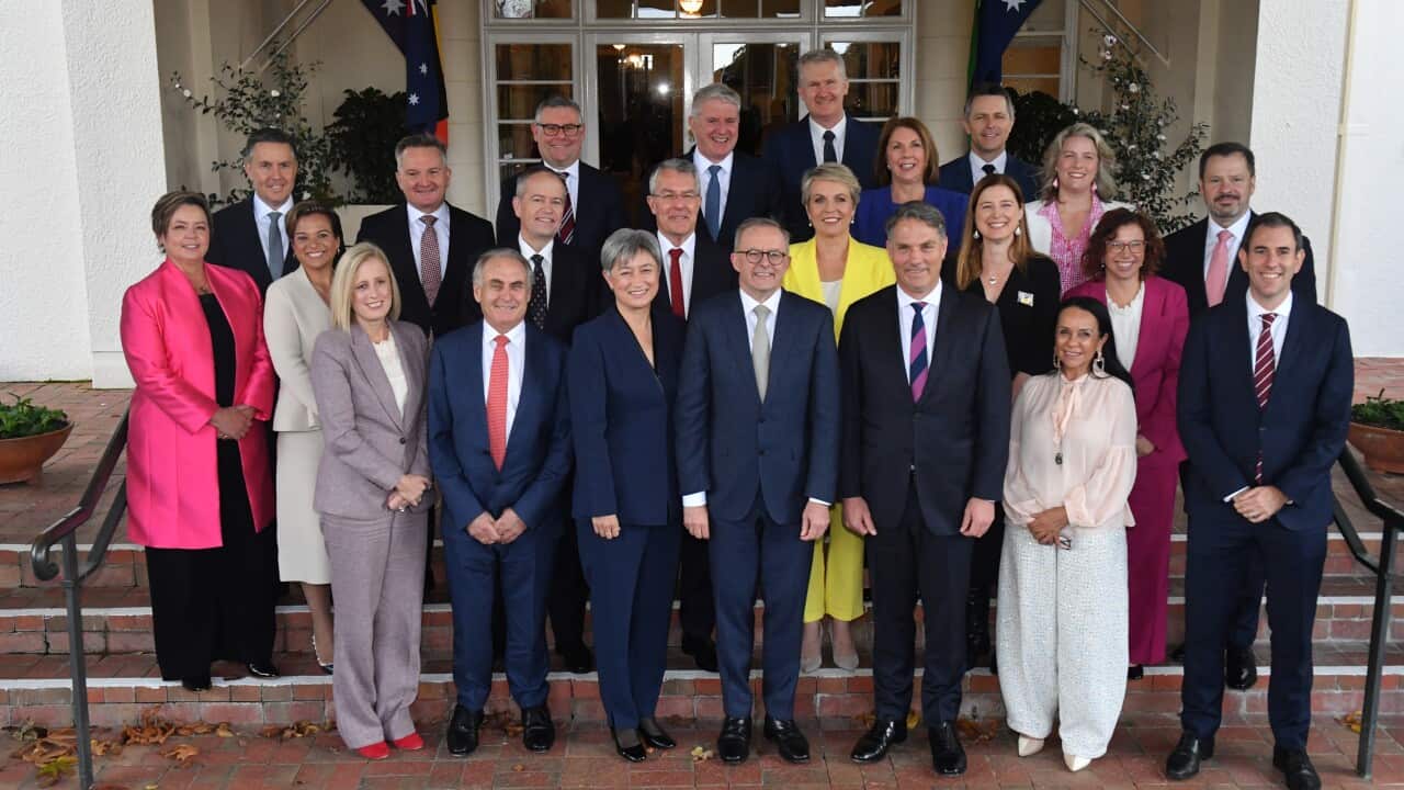 Prime Minister Anthony Albanese and his cabinet pose for photographers after swearing-in ceremony at Government House in Canberra, Wednesday, June 1, 2022. Prime Minister Anthony Albanese has unveiled the make up of his first frontbench, with a record 13