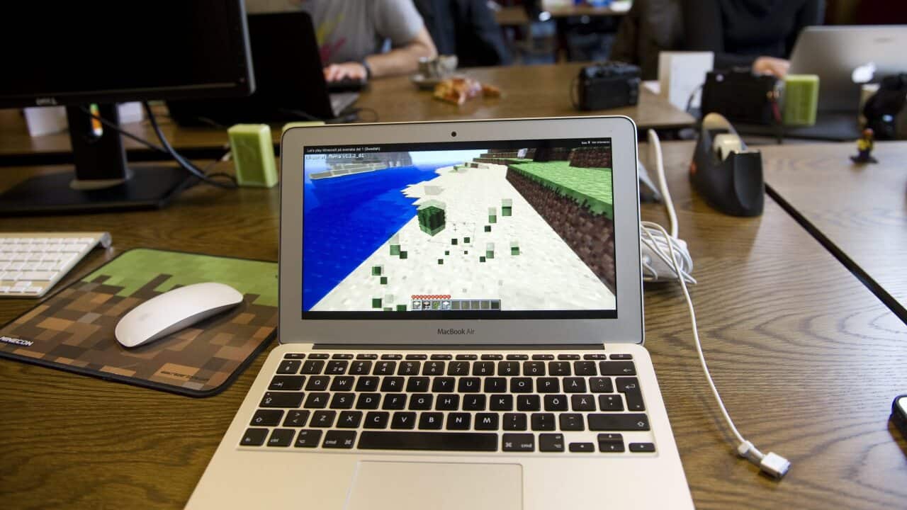 A computer with Minecraft on the screen