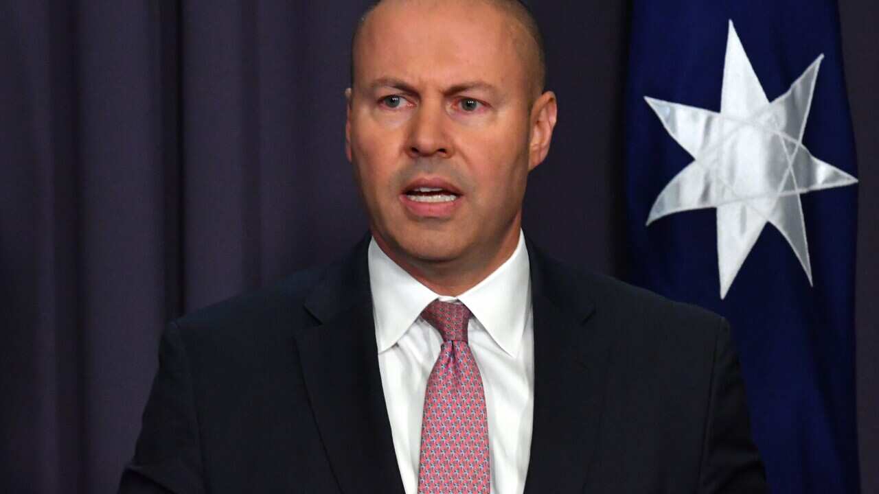 Federal Treasurer Josh Frydenberg is seen speaking.