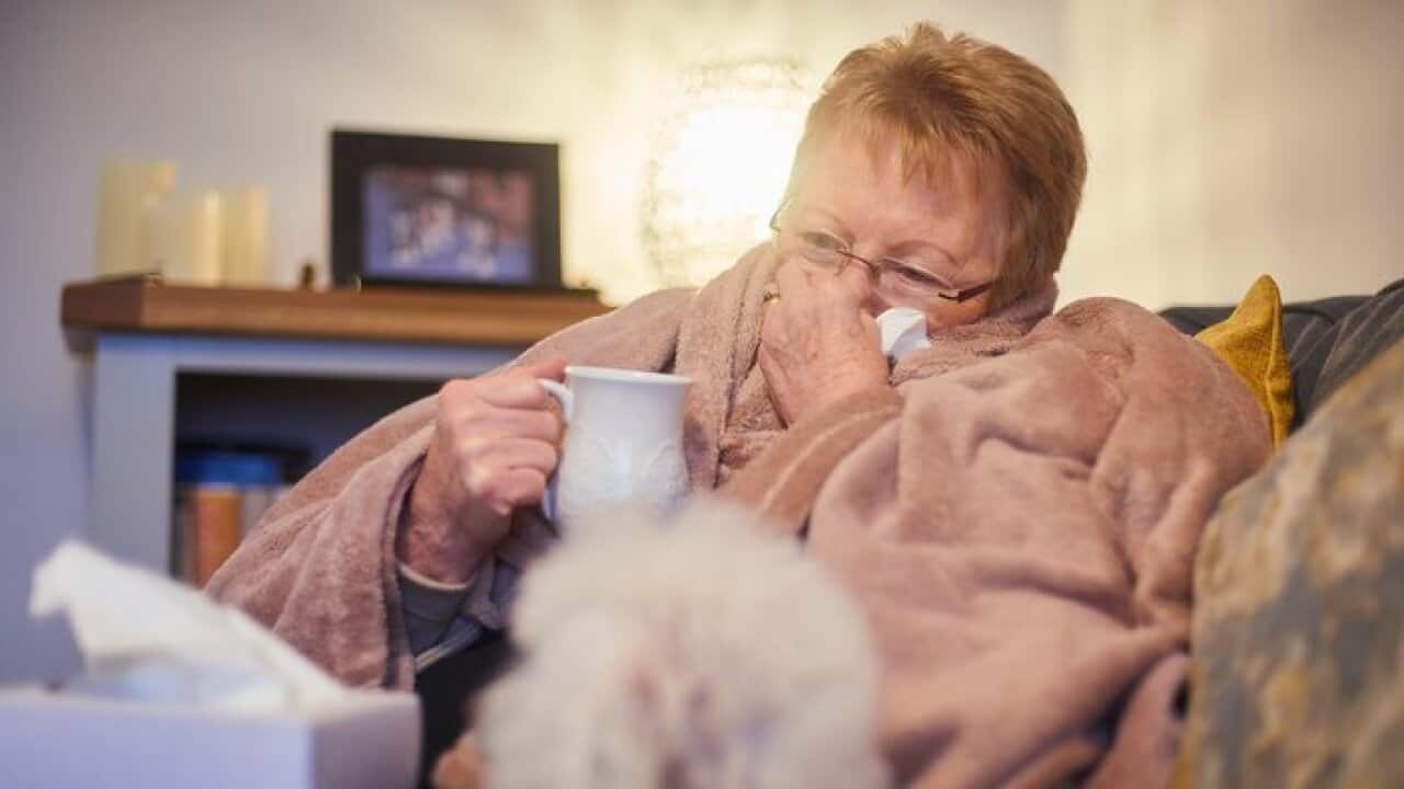Senior woman with a cold