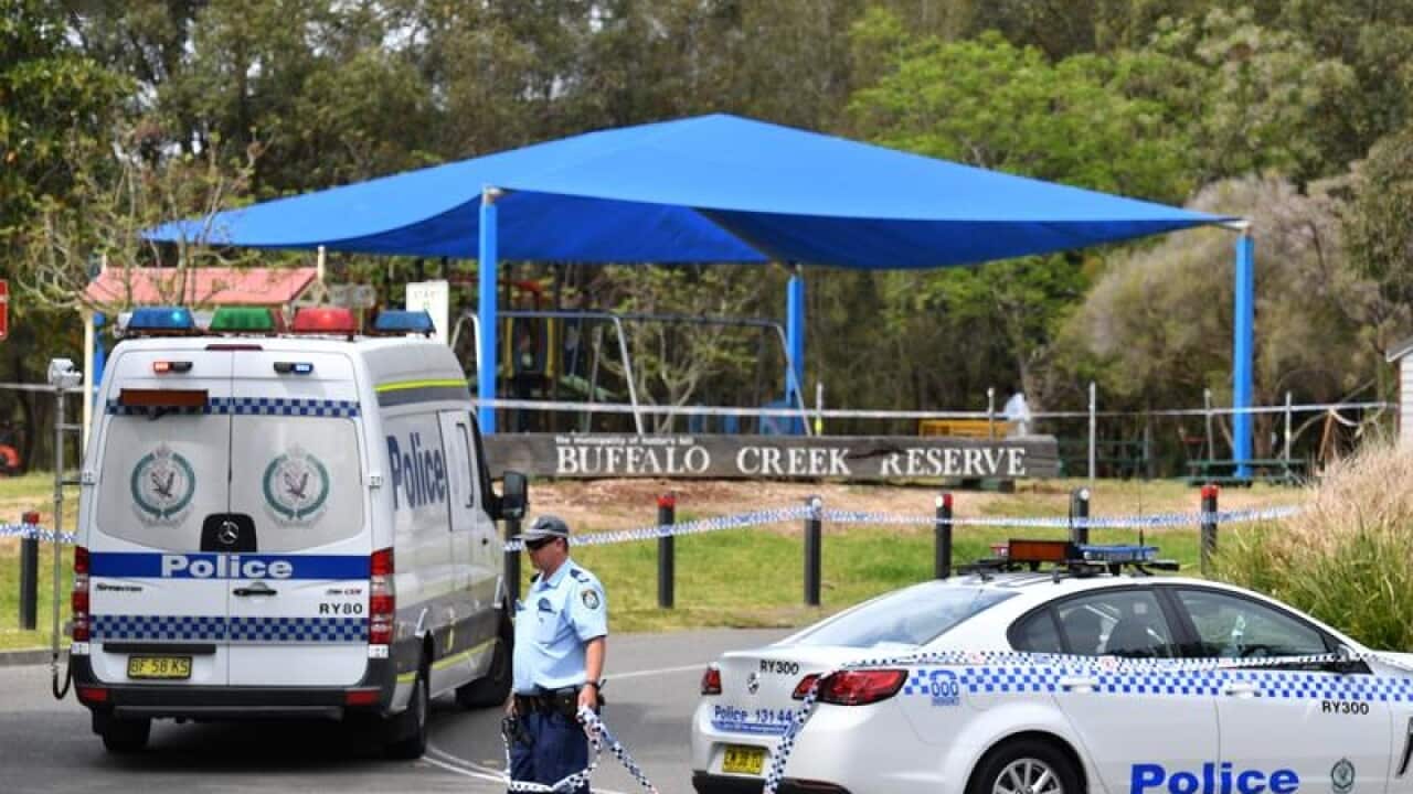 NSW Police cordon off an area of the Buffalo Creek Reserve.