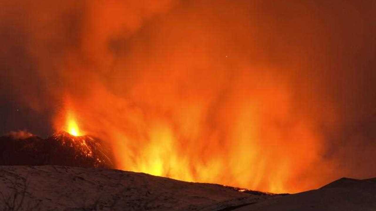Mount Etna has burst into life for the third time in just under three weeks, spitting molten lava nearly 650 feet into the sky above Catania, Sicily
