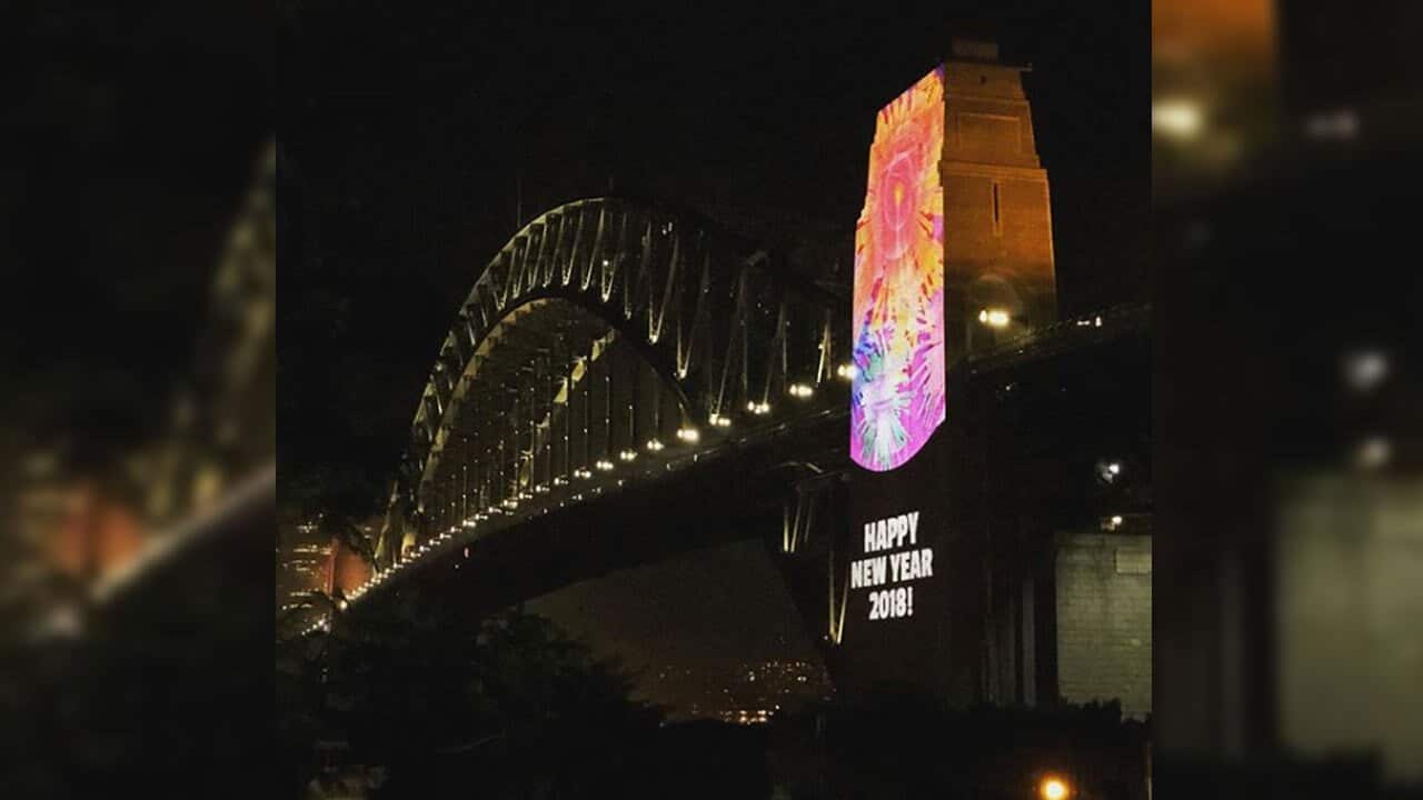 "Happy New Year 2018" lit up on the Sydney Harbour Bridge much to the surprise of some revellers.