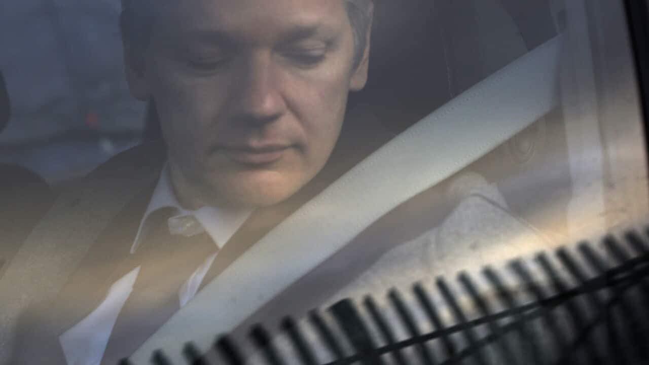 WikiLeaks founder Julian Assange arrives at Belmarsh Magistrate's court in London for an extradition hearing.