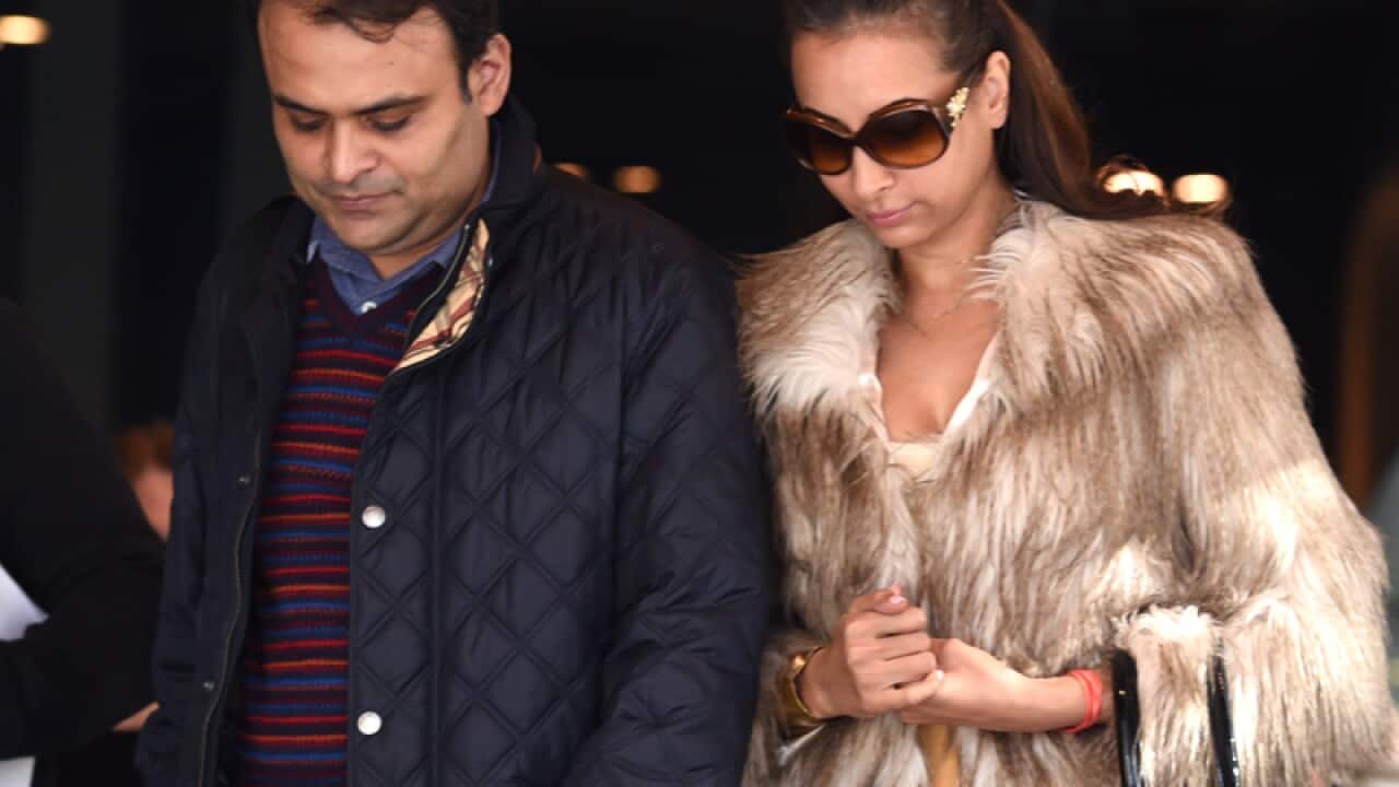 Pankaj and Radhika (right) Oswal