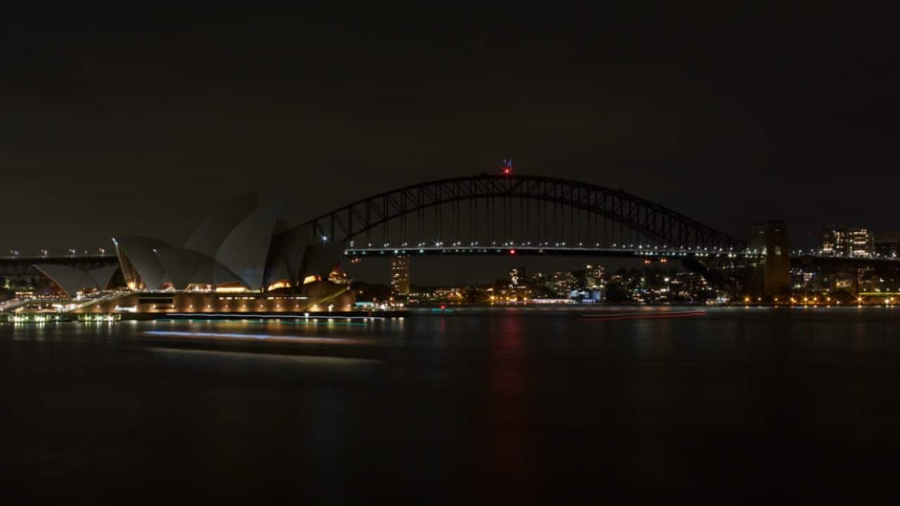 The Sydney Opera House had the lights on its sails switched off to mark Earth Hour. 