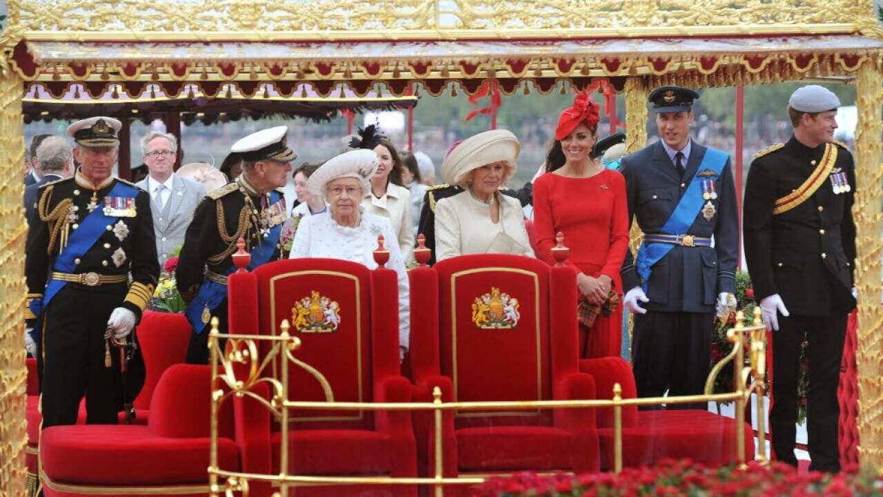 Members of the Royal family (from left to right) Prince of Wales, Duke of Edinburgh, Queen Elizabeth II, Duchess of Cornwall, Duchess of Cambridge, Duke of Cambridge and Prince Harry onboard the Spirit of Chartwell during the Diamond Jubilee Pageant on th
