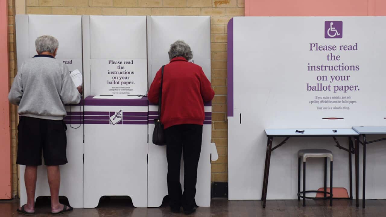 Voters cast their ballots