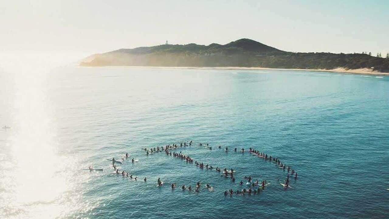 surfers locals have taken part in a paddle out in protest of a Netflix TV show