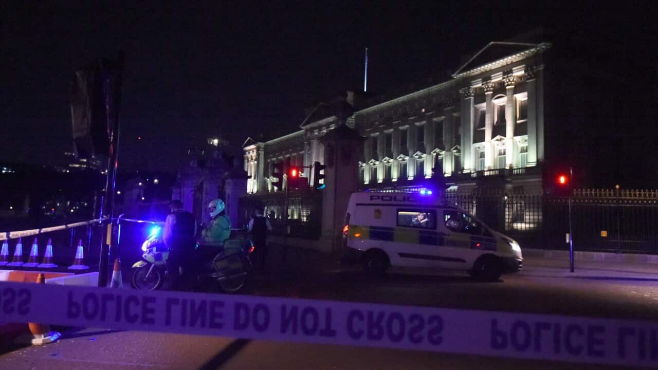 A police cordon outside Buckingham Palace, where a man has been arrested after attacking police.