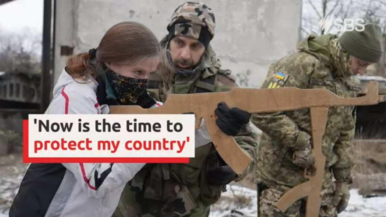 These Kyiv residents are taking up arms to protect their city