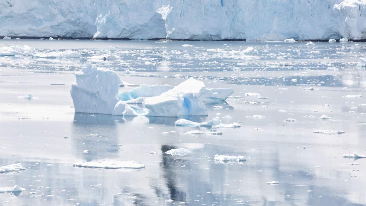 A fractured and melting iceberg is seen in Antarctica.