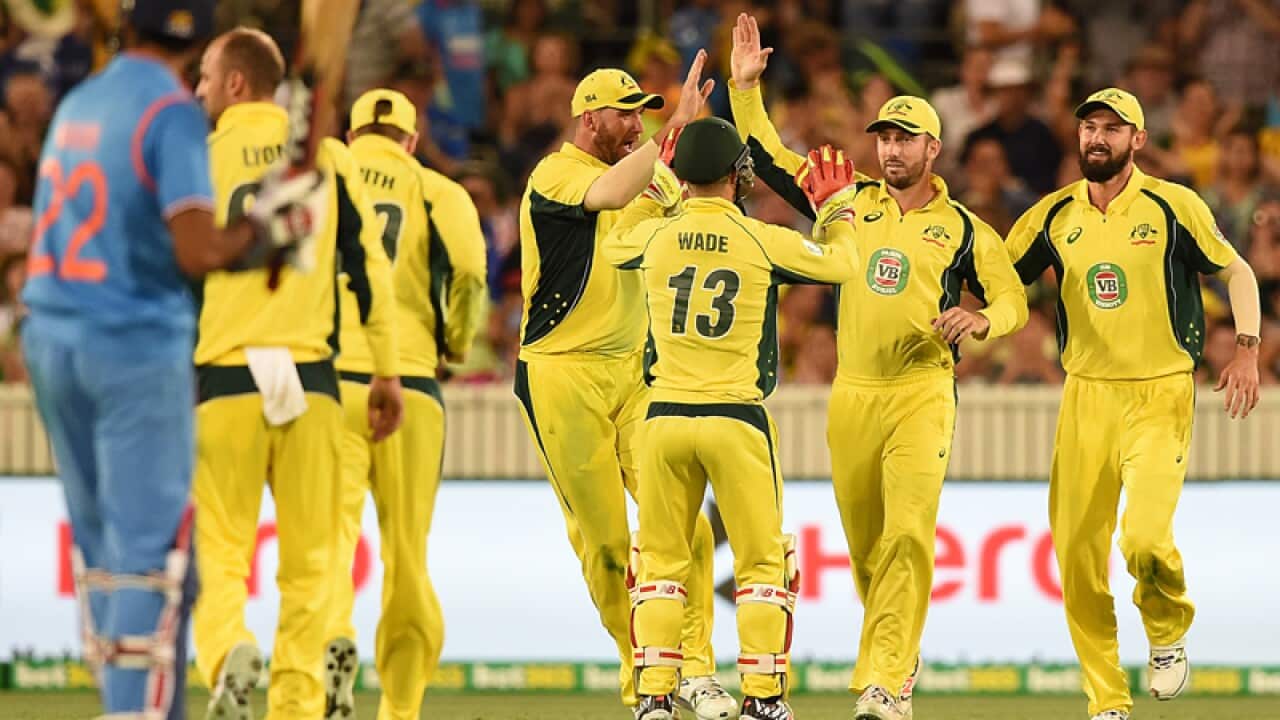 Australia celebrate the wicket of India's Gurkeerat Singh