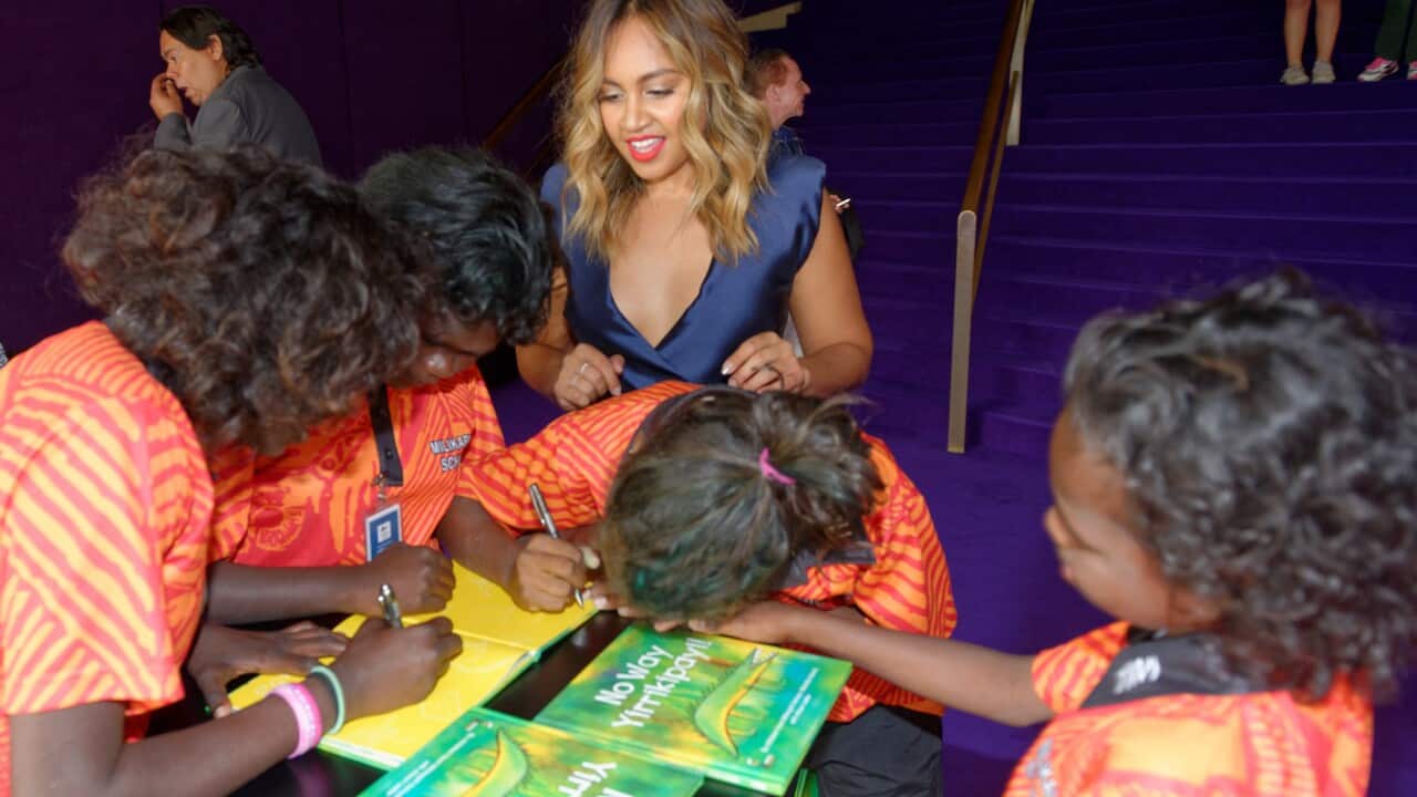 Children read books they wrote with pop star and literacy ambassador Jess Mauboy